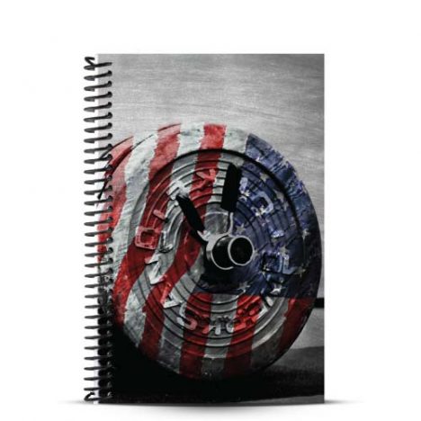 Weightlifting workout journal with american flag art draped over barbell