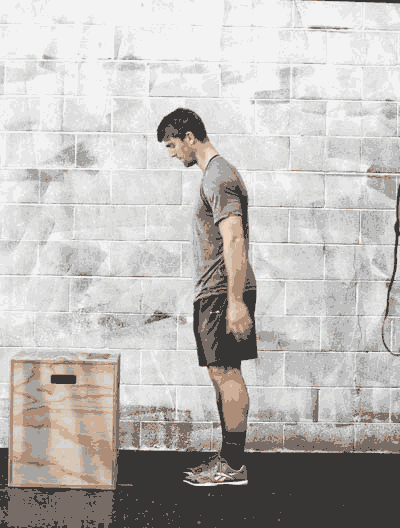 This is a gif animated image of an athlete performing a box jump