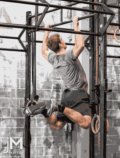 This is a gif animated image of an athlete performing a butterfly kipping pull-up