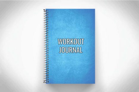 Blue Workout Journal on gray background