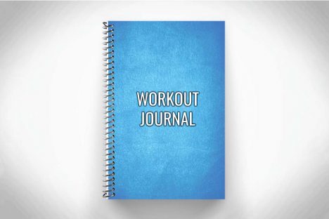 Blue Workout Journal on gray background