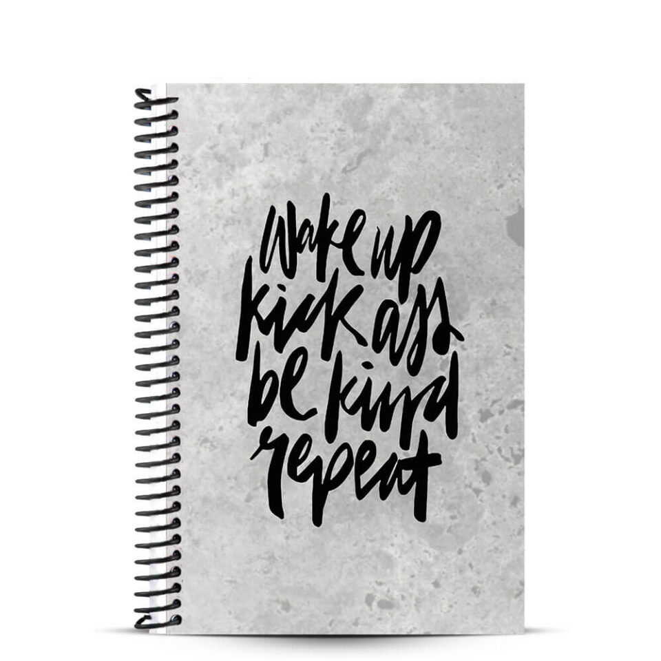 front cover of journal showing wake up kick ass repeat quote on it
