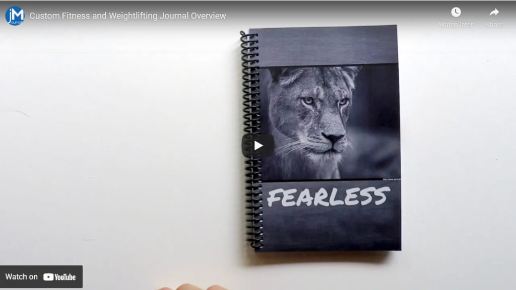 weightlifting journal overview video link with grey and black lion journal cover and the word fearless on the front